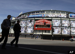 The Marquee at Wrigley Field, one day before the Chicago Cubs home opener against the Washing Nationals in Chicago, Wednesday, April 4, 2012. Renovation of Wrigley Field, the 1914 stadium getting ready for opening day Thursday, has been tossed around for years. But funding has stalled plans. (AP Photo/Nam Y. Huh)
