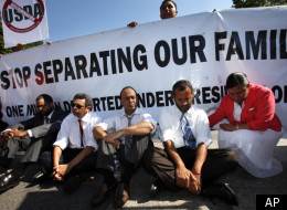 Rep. Luis Gutierrez (D-Ill.), third from right, performs an act of civil disobedience outside the White House in support of immigration reform in July 2011.
