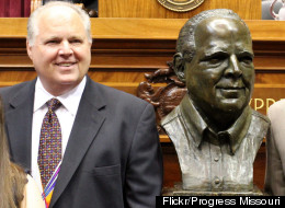 Rush Limbaugh and a bust in his likeness at his induction into the Hall of Famous Missourians, May 14, 2012. (Photo credit: Progress Missouri)