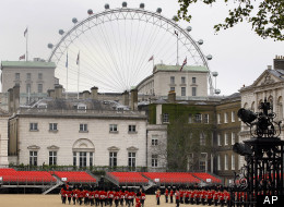 A view across Horse Guards Parade in London, as a rehearsal for Trooping the Colour takes place. The London 2012 Beach Volleyball will be held in Horse Guards Parade, and the offices of the Scotland Office have windows which look out across the venue. (AP Photo/Kirsty Wigglesworth)