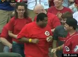 Reds fan Caleb Lloyd caught two home run balls in a game against the Braves.