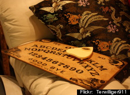 San Francisco supervisor John Avalos says he consulted a Ouija board before city leaders voted on whether to recommend naming a Navy ship after slain gay rights activist Harvey Milk.