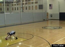 Nick DiChaira shows off his skills by sinking baskets with a football in his trick shot video.