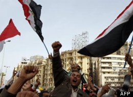 Des manifestants au centre du Caire, en Égypte, en février 2011 (AFP/Mohammed Abed)
