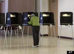 A lone voter casts a ballot in a downtown Miami condo complex on Jan. 31, during Florida's presidential primary. Florida was the first of what are now 14 states that have expressed interest in identifying non-citizens on their voter rolls.