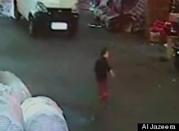 Hu Jun, the driver seen on this video, is on trial for allegedly running over and then leaving a toddler to die.