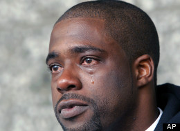 Brian Banks weeps after his rape conviction was dismissed in court Thursday, May 24, 2012, in Long Beach, Calif. It has been 10 years since Banks, then 16, pleaded no contest to a rape charge brought after a childhood friend falsely accused him of attacking her on their high school campus, shattering his dreams of a pro career. (AP Photo/Nick Ut)