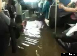 This Montreal bus was flooded by rising waters in Montreal. (YouTube/Radio-Canada)