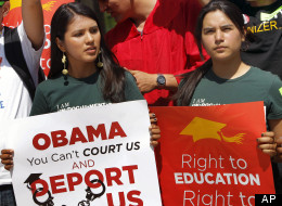 Martha Melendrez, right, and Sofia Campos, left, protest at a