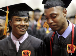 In this photo taken Saturday, June 12, 2010 Urban Prep High School graduating seniors Marcus Bass, left, smiles at classmate Cameron Barnes as Barnes reflects on the absence of his mother who died last year during graduation ceremonies in Chicago. when Cameron Barnes' mother died last year of liver disease, he returned to school the next day, finding solace there.