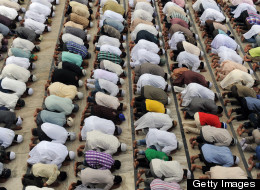 Indian Muslims offer Eid al-Fitr prayers at the Shahi Jama Masjid in Ahmedabad on August 31, 2011. The Eid-al Fitr Festival marks the end of the holy fasting month of Ramadan