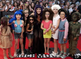 Sometimes the best accessory is a diminutive version of yourself. Just ask Katy Perry at this year's MMVAs.