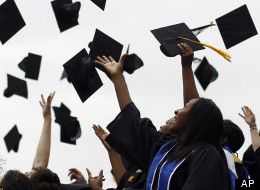 Graduates from various institutions take part in the Toss Your Caps May 20, 2011, in Philadelphia. College graduates are more likely to progress economically than those without a degree.