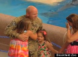 Army Sergeant Keith Howse with daughters Nataja and Jorja. (Brookfield Zoo)