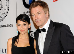 This June 12, 2012 file photo shows actor Alec Baldwin and his fiancee Hilaria Thomas at The Friars Club and Friars Foundation Honor of Tom Cruise at The Waldorf-Astoria in New York. (Photo by Evan Agostini/Invision/AP, file)