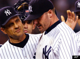 New York Yankees pitcher Roger Clemens is congratulated by manager Joe torre, left, as he is relieved in the eighth inning against the Boston Red Sox, Tuesday, Sept. 3, 2002 in New York. Catcher Jorge Posada is second from left and shortstop Derek Jeter is on the right. The Yankees won, 4-2, and Clemens finished with 10 strikeouts. (AP Photo/Mark Lennihan)