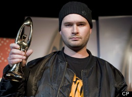 Manu Militari holds up his award for best hip-hop album at the Adisq 'The Other Gala' awards show in Montreal Monday, November 01, 2010. (CP/Graham Hughes