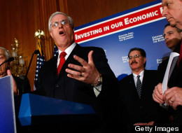 National Education Association President Dennis van Roekel (C) speaks during a press conference on the economic recovery package as Sen. Dick Durbin (D-IL) (R) and Sen. Frank Lautenberg (D-NJ) (L) listen February 5, 2009 on Capitol Hill in Washington, DC.
