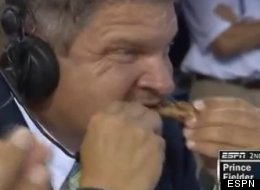 ESPN analyst John Kruk eats ribs while watching Prince Fielder hit during the second round of the 2012 MLB Home Run Derby.