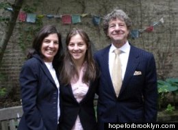 Judge Gustin Reichbach (R) poses with wife Ellen Meyers (L) and daughter Hope Reichbach (C) in 2010.