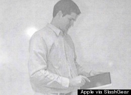 Jonathan Ive playing with an iPad prototype sometime between 2002 and 2004.