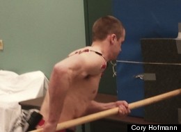 A volunteer performs a spear-thrusting task like a Neanderthal would as electrodes monitor his muscle activity.