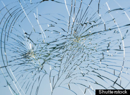 Michael Steven Poret, a broker at UBS Financial Services, has been accused of smashing dozens of windows of local businesses with a slingshot.