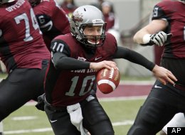 Montana quarterback Jordan Johnson scrambles outside the pocket during the first half against Central Arkansas in an NCAA college football playoff game in Missoula, Mont., on Saturday, Dec. 3, 2011. Montana won 41-14. (AP Photo/Michael Albans)