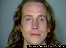Christopher Meusburger allegedly threatened his 62-year-old neighbor with a sword after she criticized the way he treated a book she lent him.