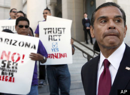 Los Angeles Mayor Antonio Villaraigosa, talks to the media at a news conference during a demonstration in Los Angeles. (AP Photo/Nick Ut)