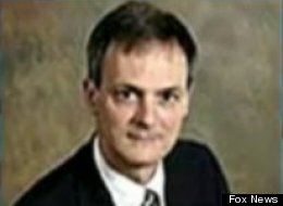 A Tennessee woman is accusing her husband, infectious disease doctor Hal Hill, above, of poisoning her coffee after tests of the drink showed high levels of a toxic substance.