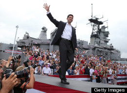 Rep. Paul Ryan, (R-Wis.), waves to a crowd in Norfolk, Va., as he is announced by presumptive Republican presidential candidate Mitt Romney as his running mate. (Photo by Justin Sullivan/Getty Images)