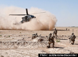 A Blackhawk helicopter lifts wounded troops from a battlefield in Afghanistan.
