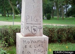 One of the headstones defaced with anti-Muslim graffiti in the Evergreen Park Cemetery this week.