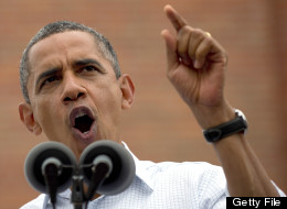US President Barack Obama delivers remarks during a campaign event at the Alliant Energy Amphitheater in Dubuque, Iowa, August 15, 2012, during his three-day campaign bus tour across the state. AFP PHOTO/Jim WATSON (Photo credit should read JIM WATSON/AFP/GettyImages)