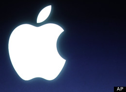 Apple logo during announcement at Apple headquarters in Cupertino, Calif., Tuesday, Oct. 4, 2011. (AP Photo/Paul Sakuma)