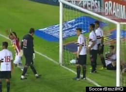 Nautico players celebrate goalkeeper Rogerio Ceni's own goal as Sao Paulo FC players look on in disbelief, 3-0.