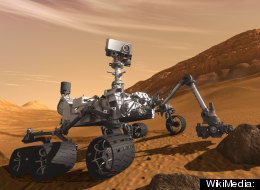 NASA's Mars rover Curiosity on Mars in a pre-landing artist's conception.