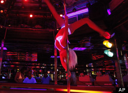 After Ottawa ruled earlier this year that foreign strippers no longer qualify for temporary foreign work visas, strip club owner Rob Katzman began a more aggressive ad campaign highlighting the perks offered by his establishment. (AP)