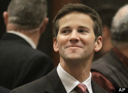 U.S. Rep. Aaron Schock, R-Ill., who used to be an Illinois state representative, visits the House floor during session at the Illinois State Capitol in Springfield.