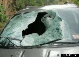 This 150-lb boulder crashed through the windshield of a rental car in Sedona, Az. The passengers, Bob Jaczko and Peter Wilson suffered minor cuts.