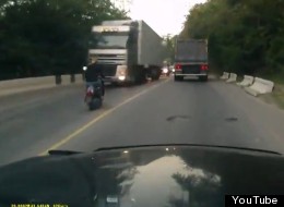 A dash cam captures a Russian woman's frightening near-death experience.