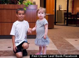 Wyatt Erber, 8, with his neighbor, 2-year-old leukemia patient Cara Kielty.