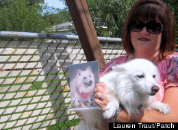 Bonnie Fouts-Bell, with a picture of Powder and dog Aspen. (Lauren Traut/Patch)