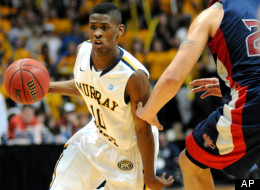 Murray State's Zay Jackson drives around St. Mary's Rob Jones during the second half of an NCAA college basketball game on Saturday, Feb. 18, 2012, in Murray, Ky. Murray State won 65-51.