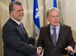 L'ex-ministre libéral Philippe Couillard et Jean Charest.
