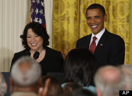 President Barack Obama and new Supreme Court Justice Sonia Sotomayor are seen in the East Room of the White House in Washington, Wednesday, Aug. 12, 2009, during a reception in her honor. (AP Photo/Ron Edmonds)