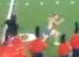 A streaker attempts to get away from a security guard at Saturday's game between Ole Miss and Texas. For the record, he failed. Miserably.