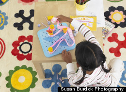 One of Sterling's product testers engages with GoldieBlox.