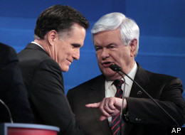 Former Massachusetts Gov. Mitt Romney and former House Speaker Newt Gingrich (R-Ga.) talk at the end of the South Carolina Republican presidential candidate debate on Jan. 16. (AP Photo/Charles Dharapak, Pool)